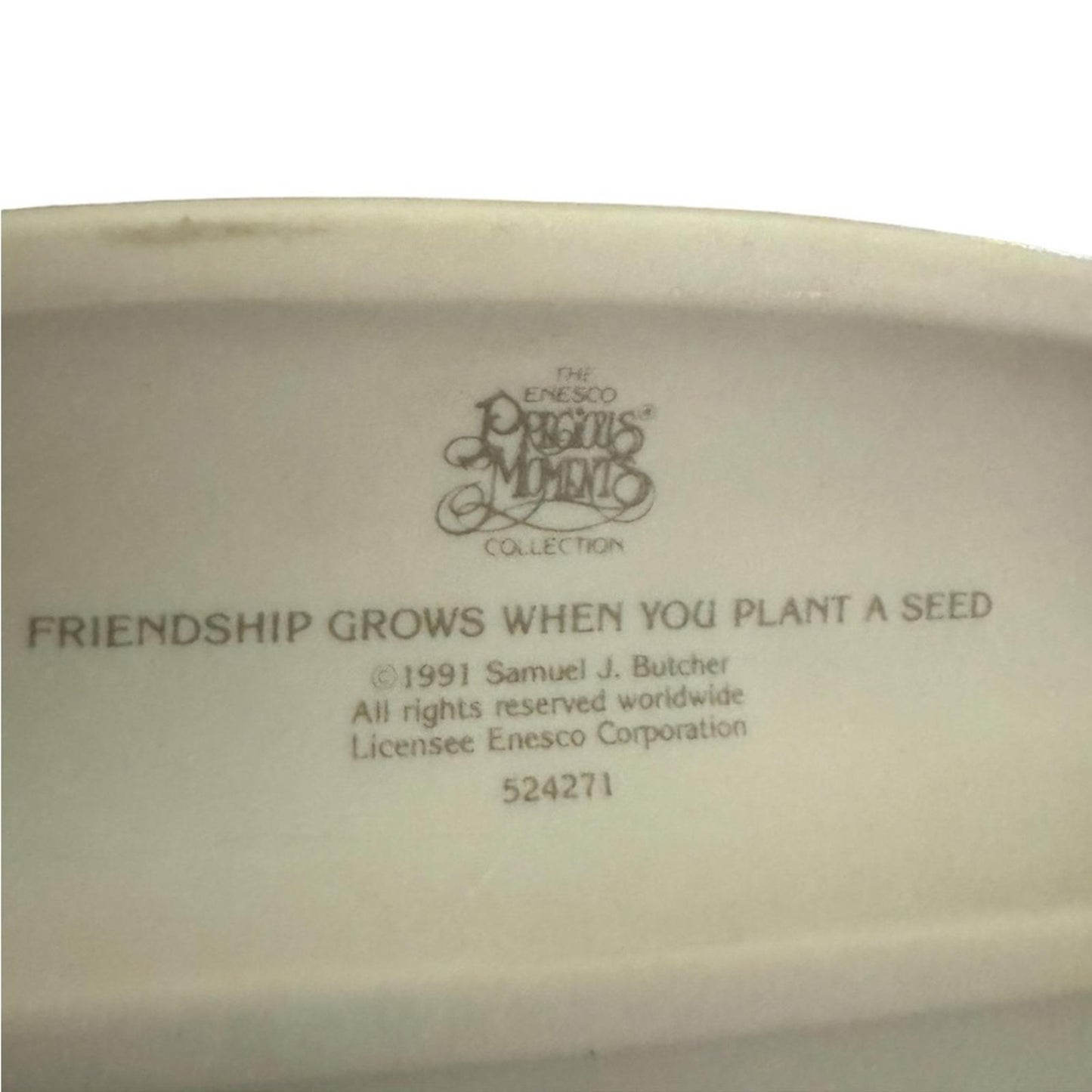 “ Friendship grows when you plant a seed” Figurine
precious moments