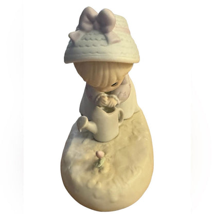 “ Friendship grows when you plant a seed” Figurine
 precious moments
