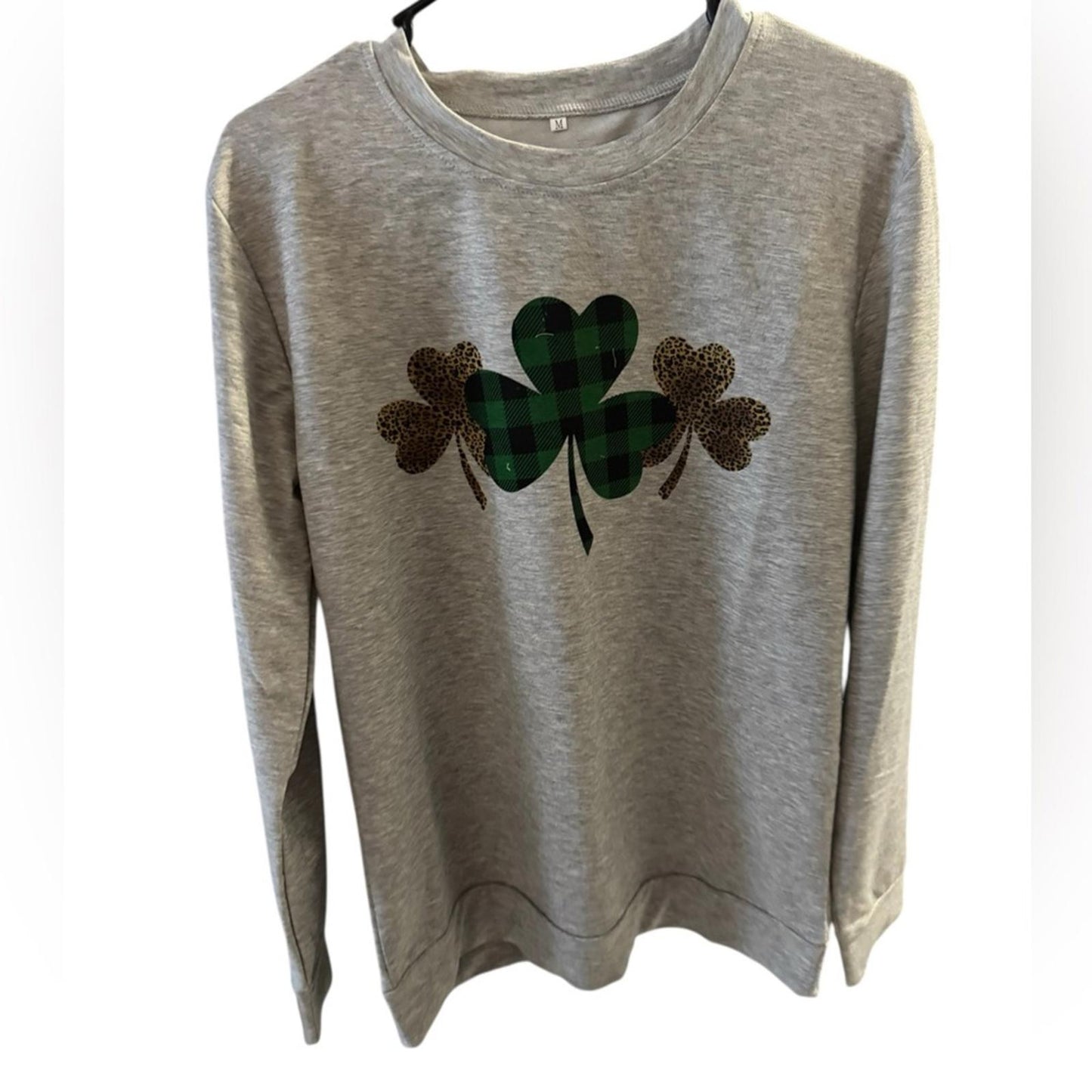 Amazon Gray Sweatshirt with Green and Brown Shamrock Design