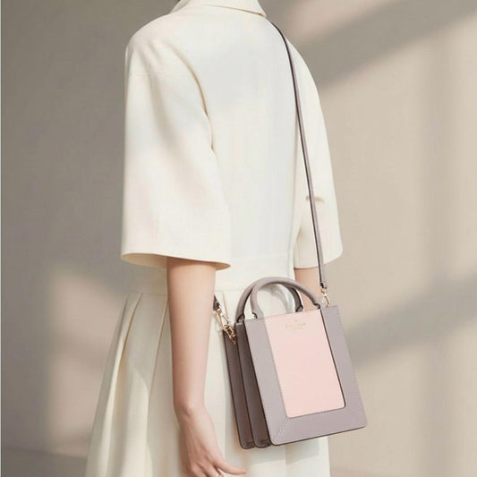 Kate Spade light, and dark lavender tones crossbody