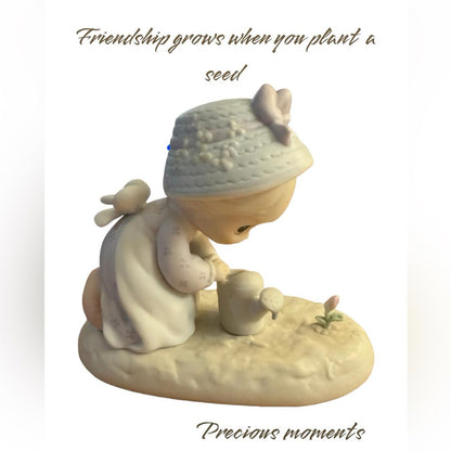 “ Friendship grows when you plant a seed” Figurine
 precious moments