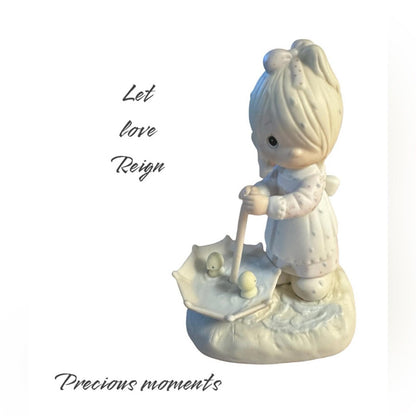 Let Love Reign”
 Precious moments Figurine