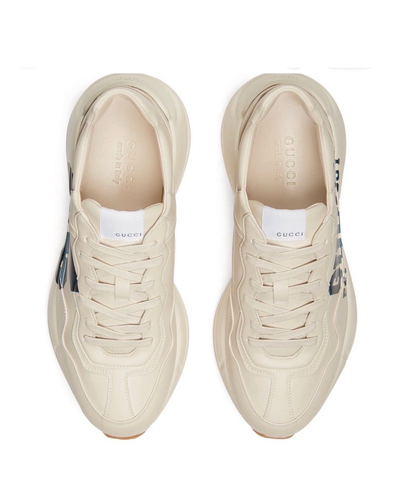 The Gucci Eschatology Rhyton leather sneaker with "Gucci Eschatology 1921" and "25" script.