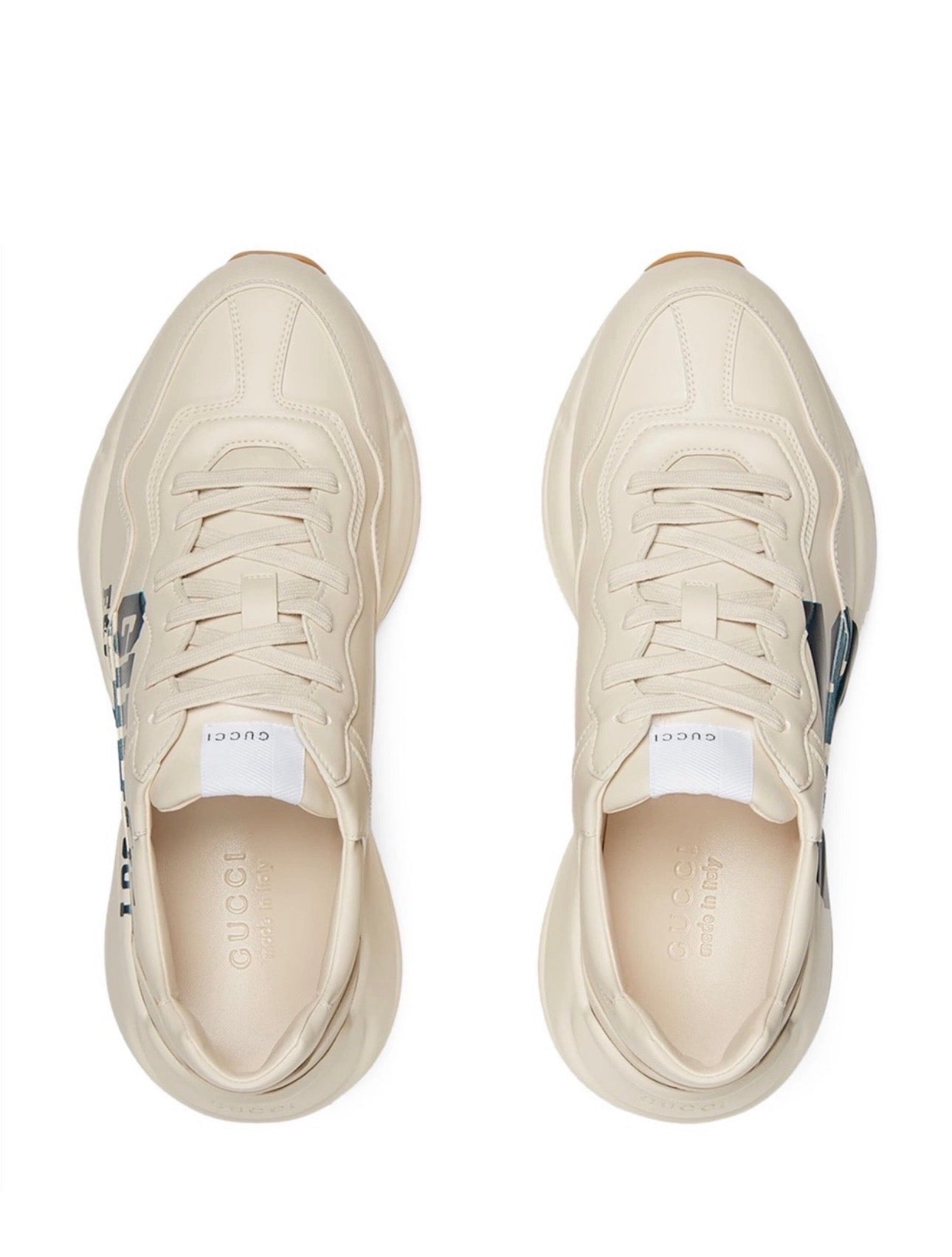 The Gucci Eschatology Rhyton leather sneaker with "Gucci Eschatology 1921" and "25" script.