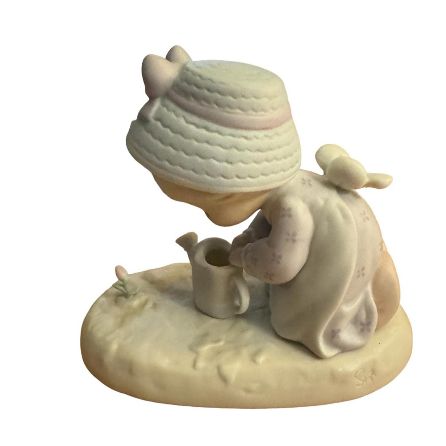 “ Friendship grows when you plant a seed” Figurine
 precious moments