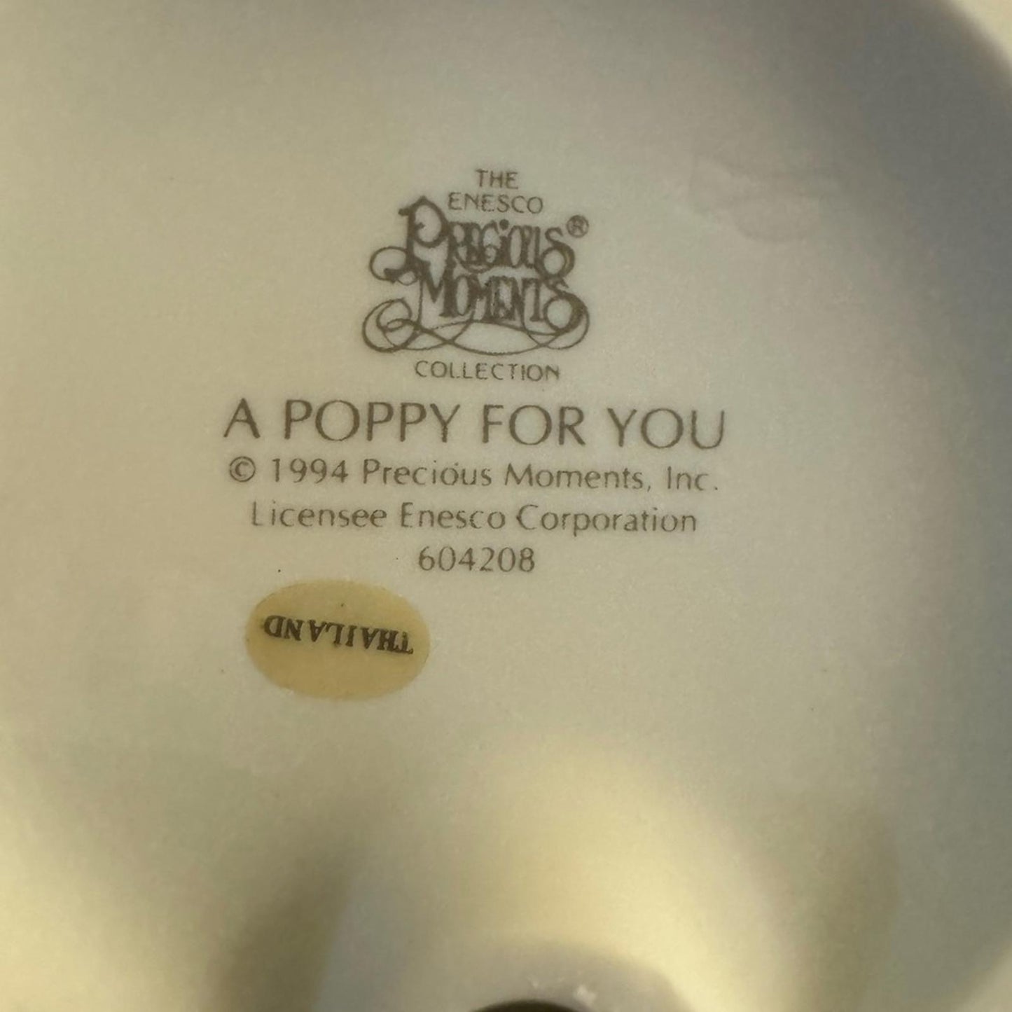 “A Poppy For You” Figurine
 precious moments